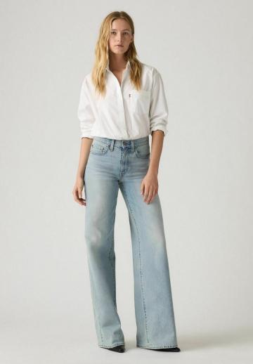 Клешеные джинсы