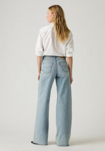 Клешеные джинсы