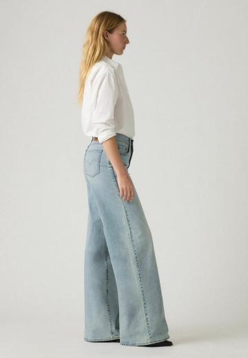 Клешеные джинсы