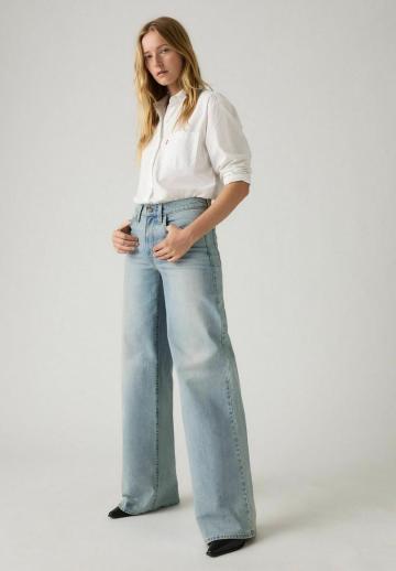 Клешеные джинсы