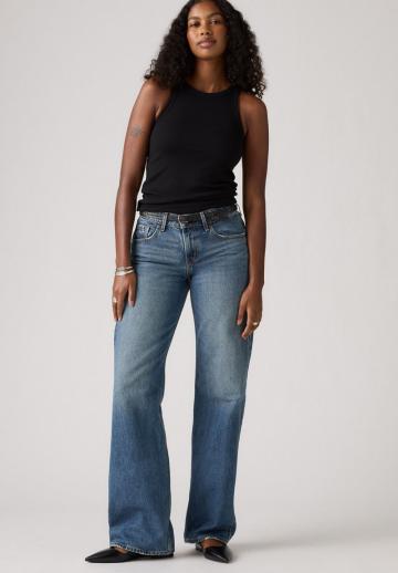 Клешеные джинсы