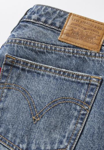 Клешеные джинсы