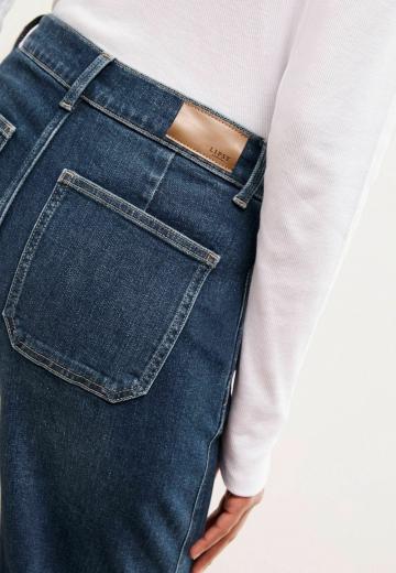 Клешеные джинсы