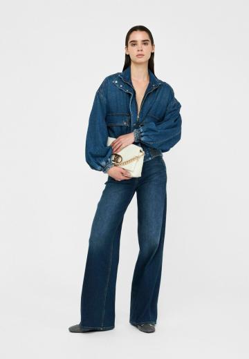 Клешеные джинсы