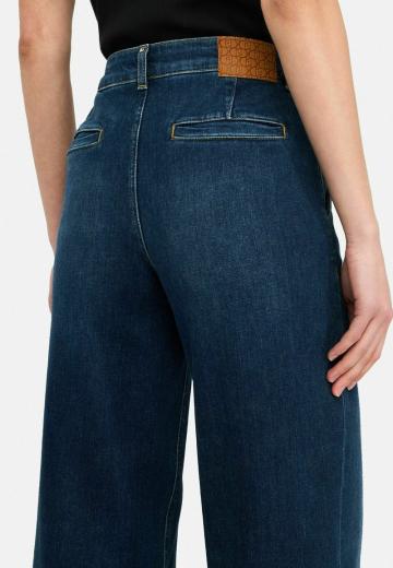 Клешеные джинсы