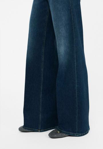 Клешеные джинсы