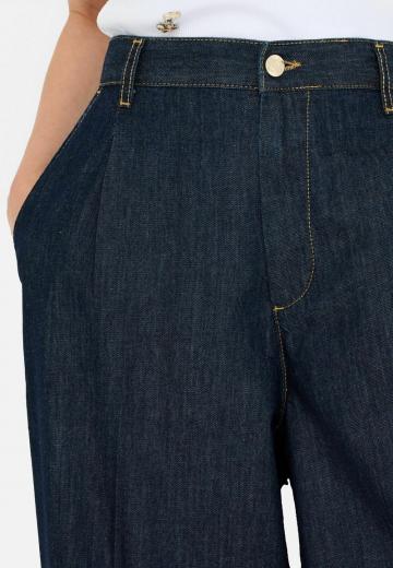 Клешеные джинсы