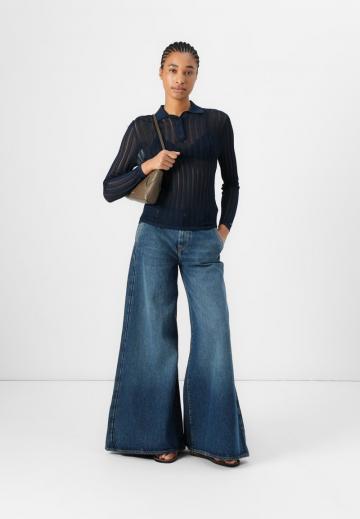 Клешеные джинсы