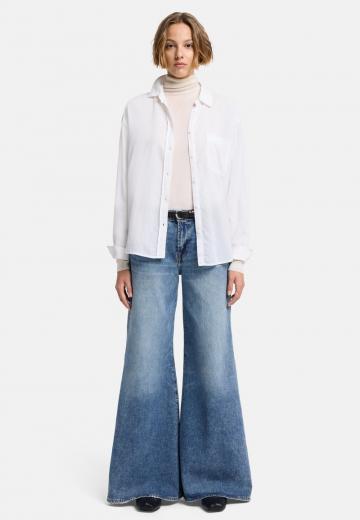 Клешеные джинсы