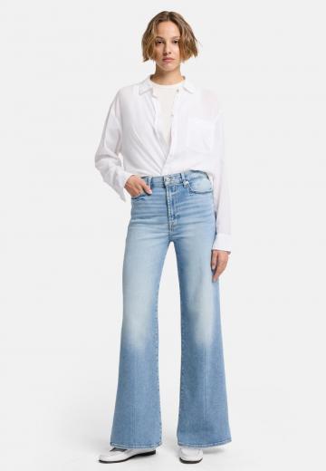 Клешеные джинсы