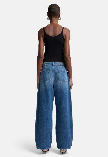 Клешеные джинсы