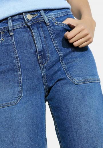 Клешеные джинсы