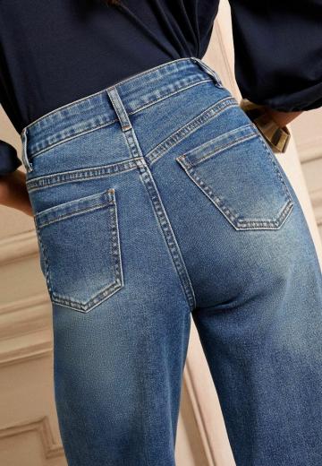 Клешеные джинсы