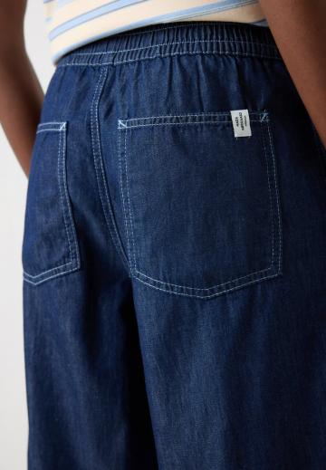 Клешеные джинсы