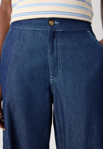 Клешеные джинсы