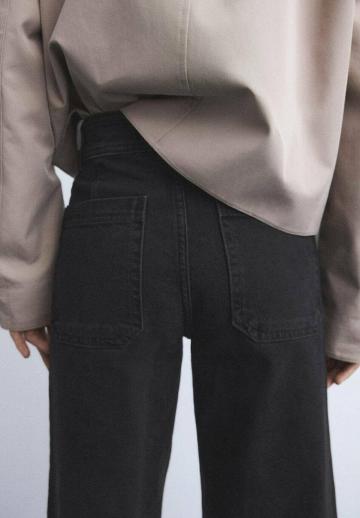 Клешеные джинсы