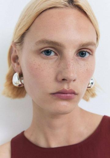 Блузка без рукавов