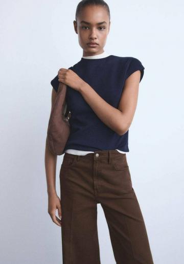 Клешеные джинсы