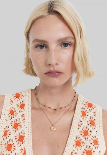 Вязаный жилет