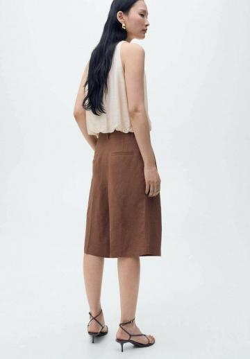 Блузка без рукавов