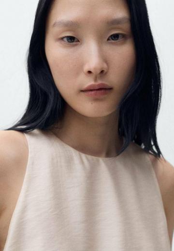 Блузка без рукавов