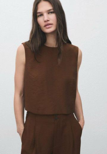 Блузка без рукавов