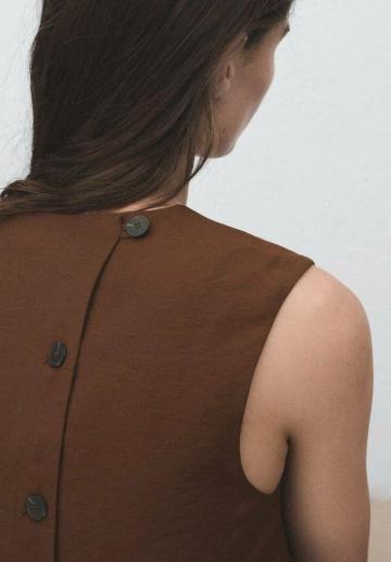 Блузка без рукавов