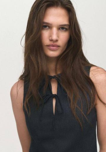 Блузка без рукавов