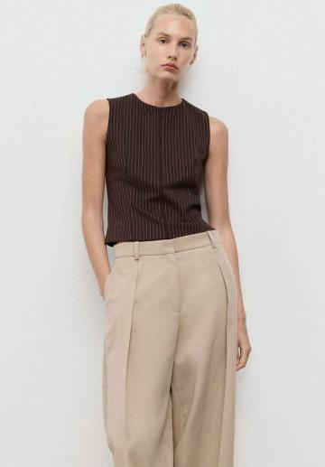 Блузка без рукавов