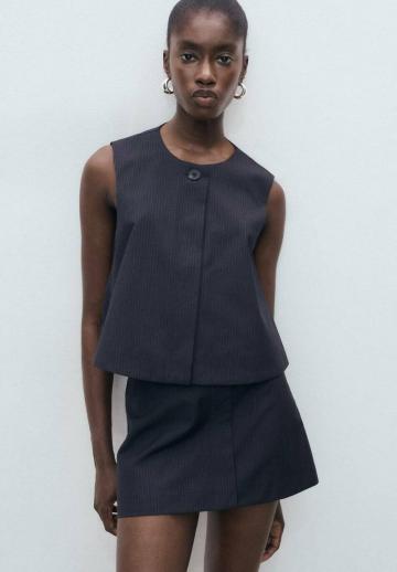 Блузка без рукавов