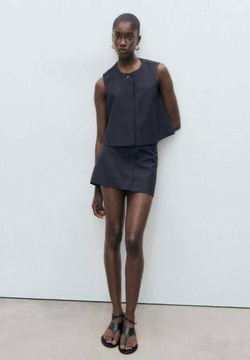 Блузка без рукавов