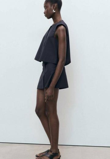 Блузка без рукавов