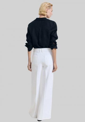 Клешеные джинсы