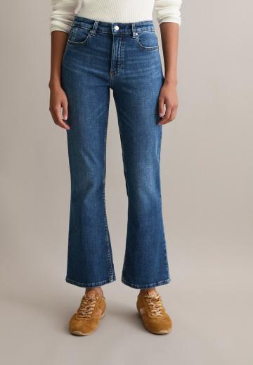 Клешеные джинсы