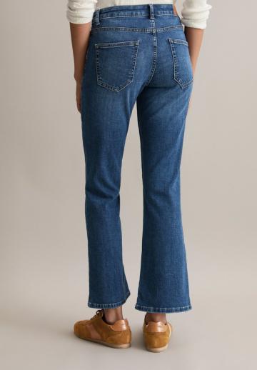 Клешеные джинсы
