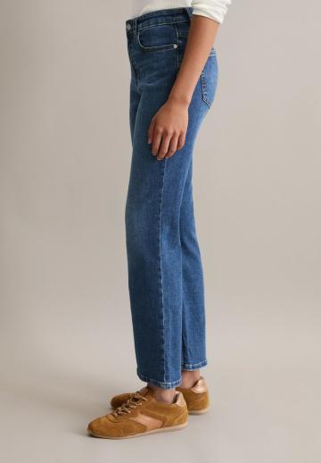 Клешеные джинсы