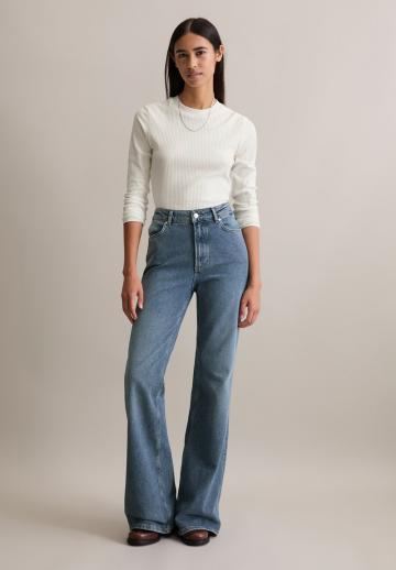 Клешеные джинсы