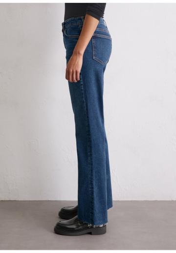 Клешеные джинсы