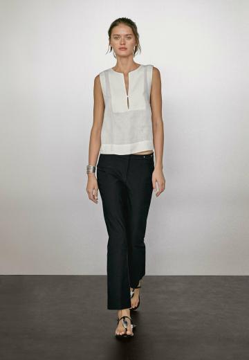 Блузка без рукавов