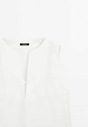 Блузка без рукавов