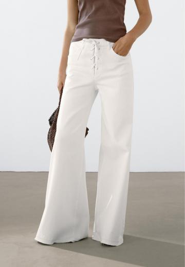 Клешеные джинсы