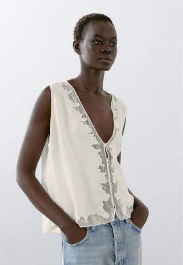 Блузка без рукавов