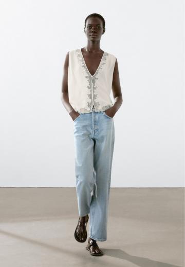 Блузка без рукавов