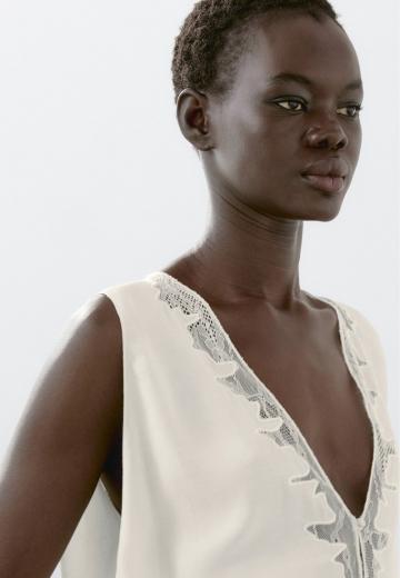 Блузка без рукавов