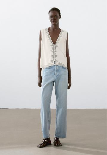 Блузка без рукавов