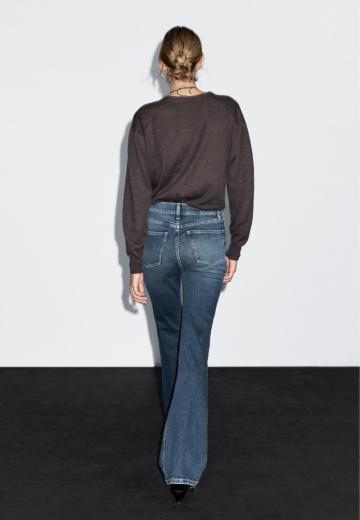 Клешеные джинсы