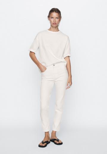 Клешеные джинсы