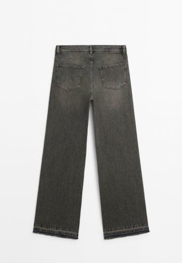 Клешеные джинсы