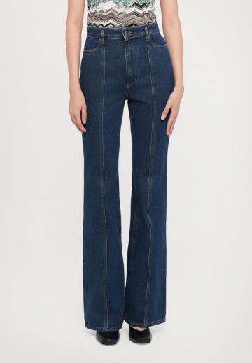 Клешеные джинсы