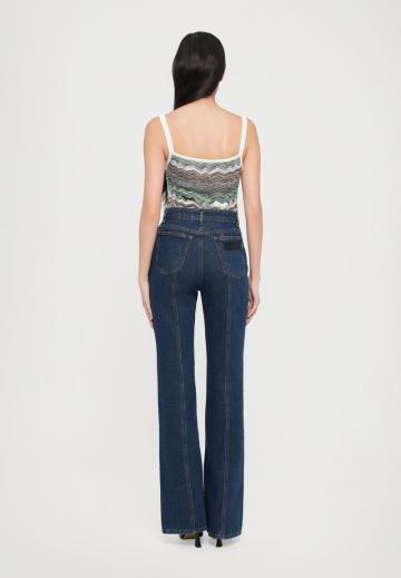 Клешеные джинсы